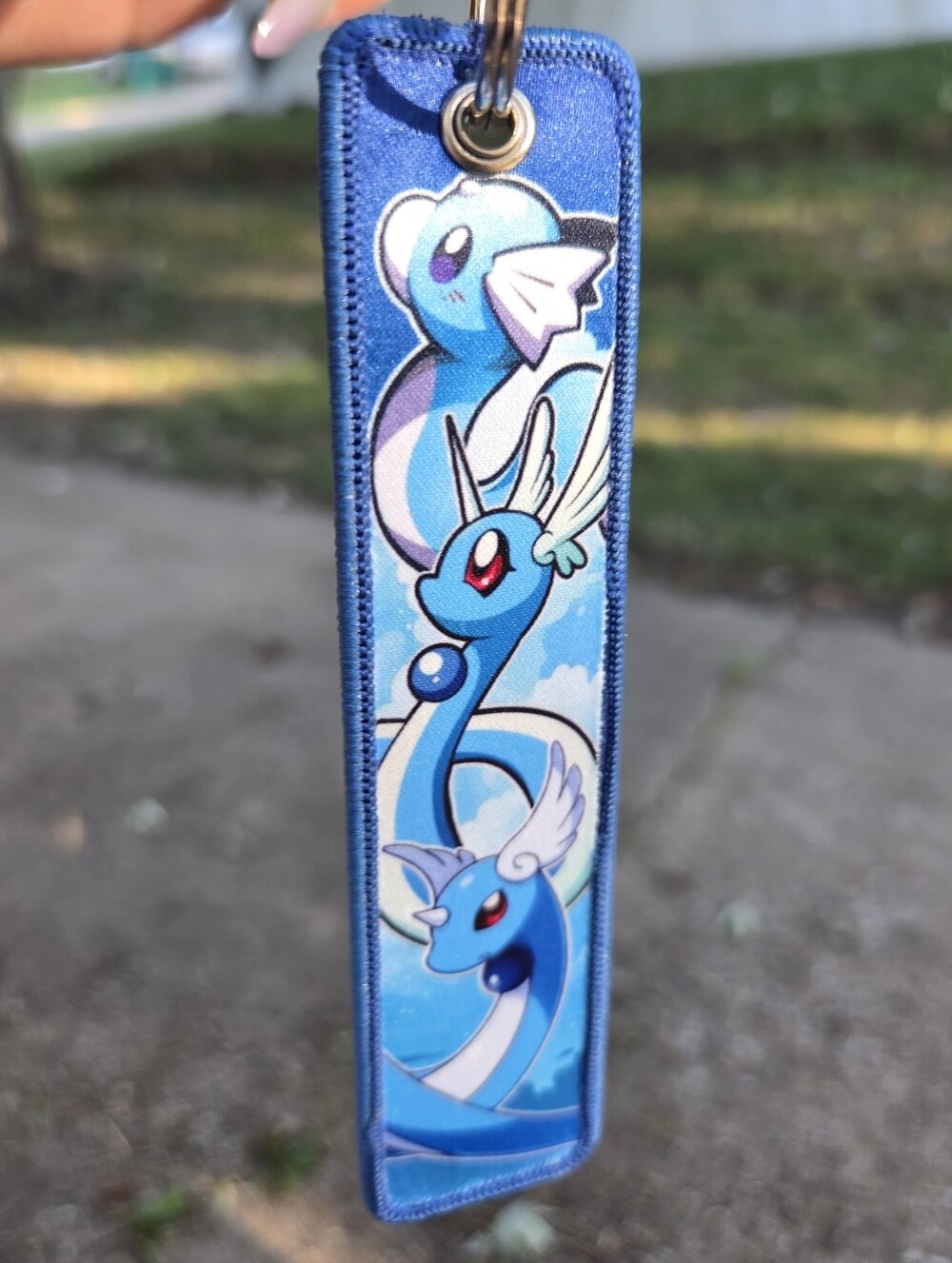Pokemon Blue Dragon Keychain Strap with Sky Artwork